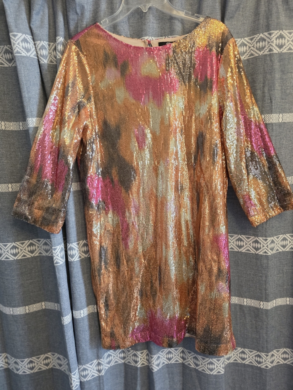 Brand new H & M Sequin dress. Size 10 Just above knee length.
